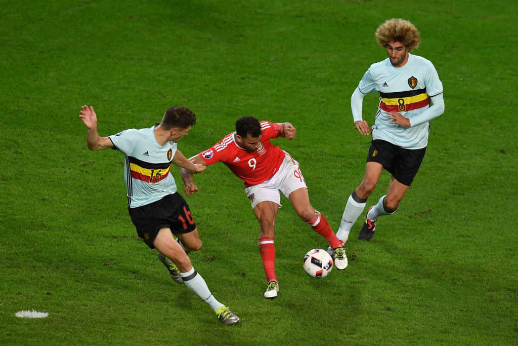 LILLE, FRANCE - JULY 01:  Hal Robson-Kanu of Wales turns Thomas Meunier and Marouane Fellaini of Belgium inside out as he scores his team'a 2nd goal during the UEFA EURO 2016 quarter final match between Wales and Belgium at Stade Pierre-Mauroy on July 1, 2016 in Lille, France.  (Photo by Mike Hewitt/Getty Images)
