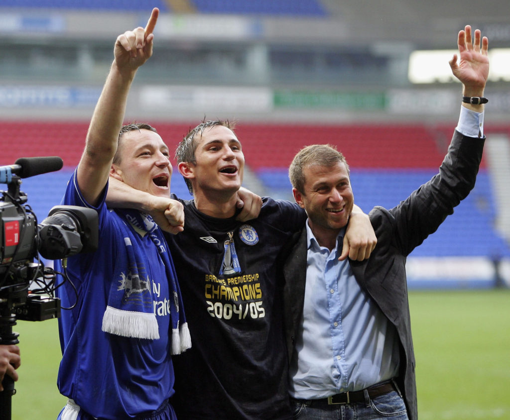BOLTON, ENGLAND - APRIL 30:  Frank Lampard, John Terry and Chairman, Roman Abramovich of Chelsea celebrate winning the Premiership after victory over Bolton Wanderers in the Barclays Premiership match between Bolton Wanderers and Chelsea at the Reebok Stadium on April 30, 2005 in Bolton, England.  (Photo by Alex Livesey/Getty Images)