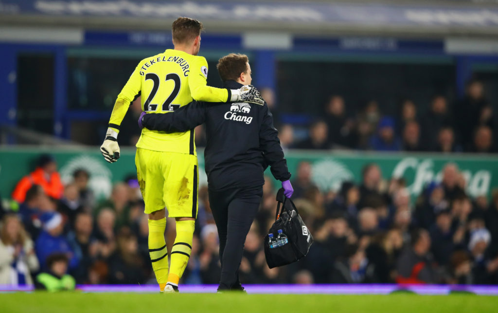 LIVERPOOL, ENGLAND - DECEMBER 19:  Injured goalkeeper Maarten Stekelenburg of Everton is given assistance during the Premier League match between Everton and Liverpool at Goodison Park on December 19, 2016 in Liverpool, England.  (Photo by Clive Brunskill/Getty Images)