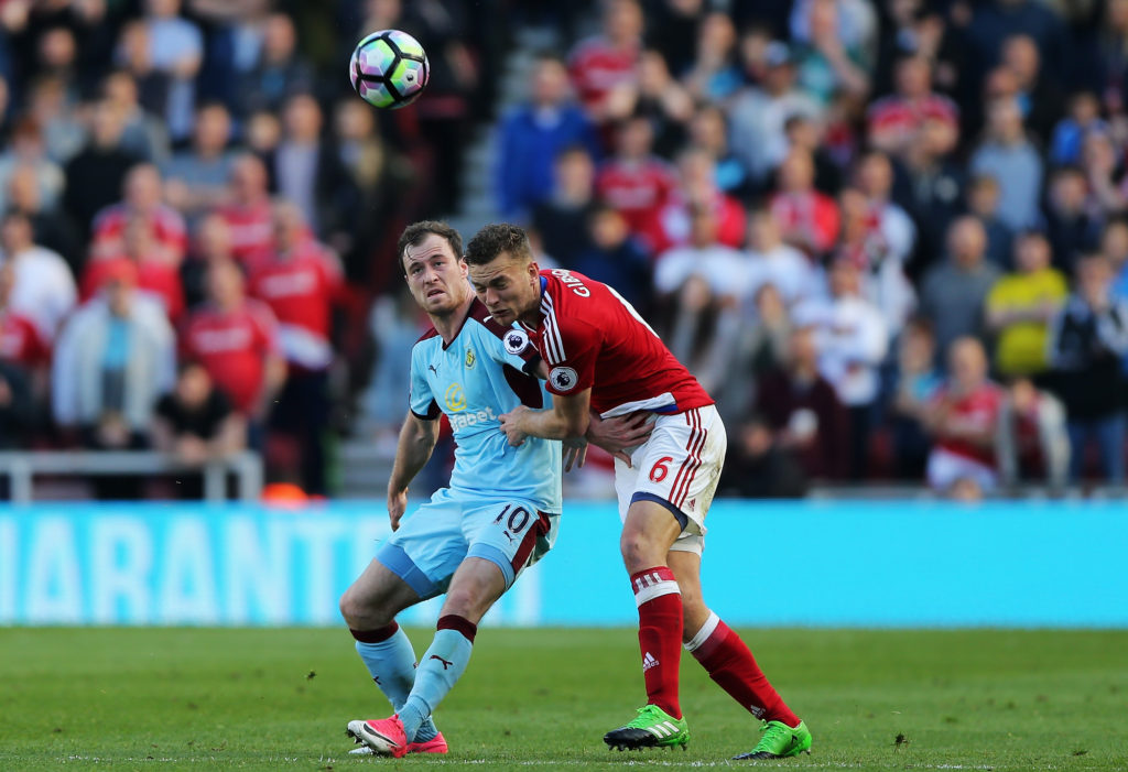 MIDDLESBROUGH, ENGLAND - APRIL 08: Ashley Barnes of Burnley and Ben Gibson of Middlesbrough battle for possession during the Premier League match between Middlesbrough and Burnley at Riverside Stadium on April 8, 2017 in Middlesbrough, England.  (Photo by Nigel Roddis/Getty Images)