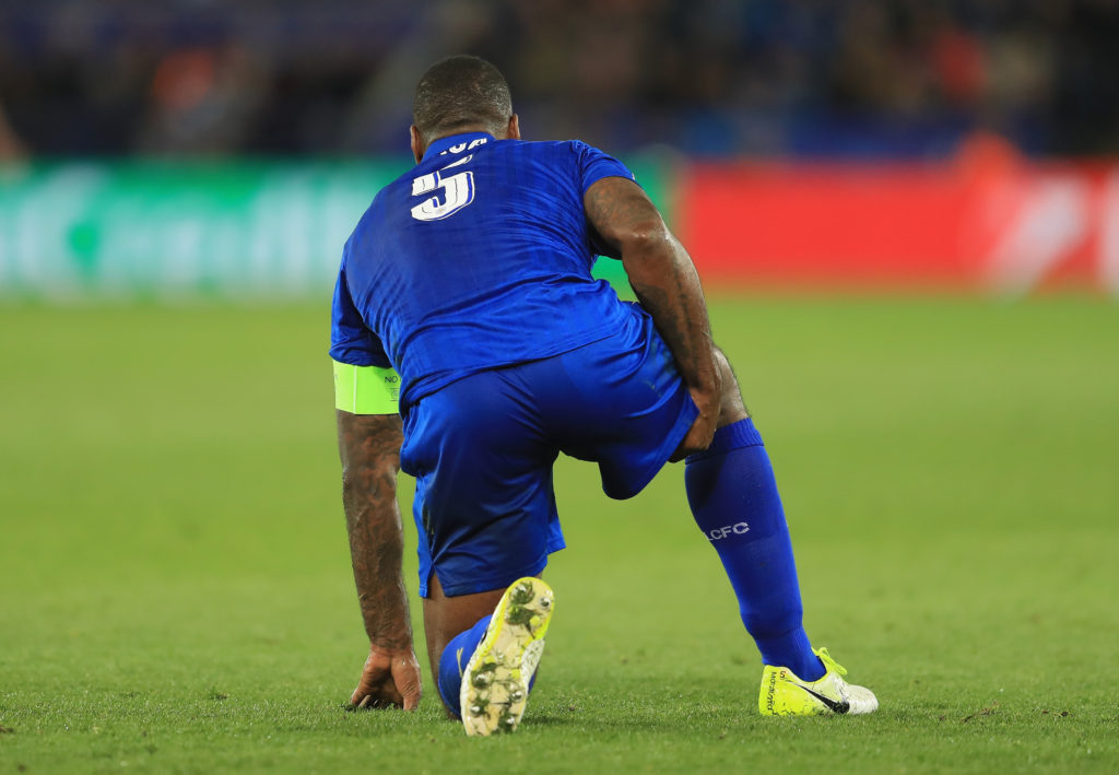 LEICESTER, ENGLAND - APRIL 18:  Wes Morgan of Leicester City pulls up injured during the UEFA Champions League Quarter Final second leg match between Leicester City and Club Atletico de Madrid at The King Power Stadium on April 18, 2017 in Leicester, United Kingdom.  (Photo by Richard Heathcote/Getty Images)