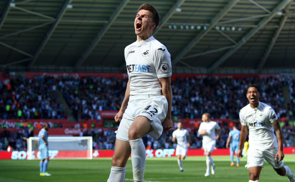 SWANSEA, WALES - APRIL 22: Tom Carroll of Swansea City celebrates scoring his sides second goal of the match during the Premier League match between Swansea City and Stoke City at The Liberty Stadium on April 22, 2017 in Swansea, Wales. (Photo by Athena Pictures/Getty Images)