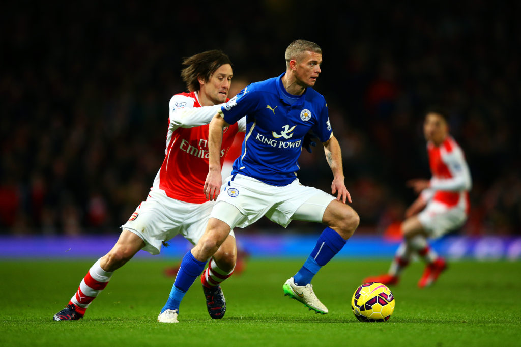 LONDON, ENGLAND - FEBRUARY 10:  Paul Konchesky of Leicester City looks for a pass under pressure from Tomas Rosicky of Arsenal during the Barclays Premier League match between Arsenal and Leicester City at Emirates Stadium on February 10, 2015 in London, England.  (Photo by Richard Heathcote/Getty Images)