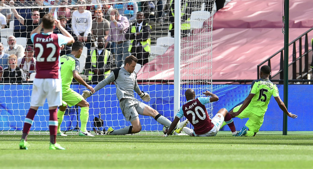 STRATFORD, ENGLAND - MAY 14:  (THE SUN OUT, THE SUNON SUNDAY OUT) Simon Mignolet of Liverpool makes a save from Andre Ayew of West Ham United during the Premier League match between West Ham United and Liverpool at London Stadium on May 14, 2017 in Stratford, England.  (Photo by Andrew Powell/Liverpool FC via Getty Images)