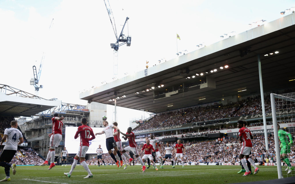 LONDON, ENGLAND - MAY 14:  Michael Carrick of Manchester United in action with Eric Dier of Tottenham Hotspur with cranes building Tottenham's new stadium in the background during the Premier League match between Mancheser United and Tottenham Hotspur at White Hart Lane on May 14, 2017 in London, England.  (Photo by John Peters/Man Utd via Getty Images)