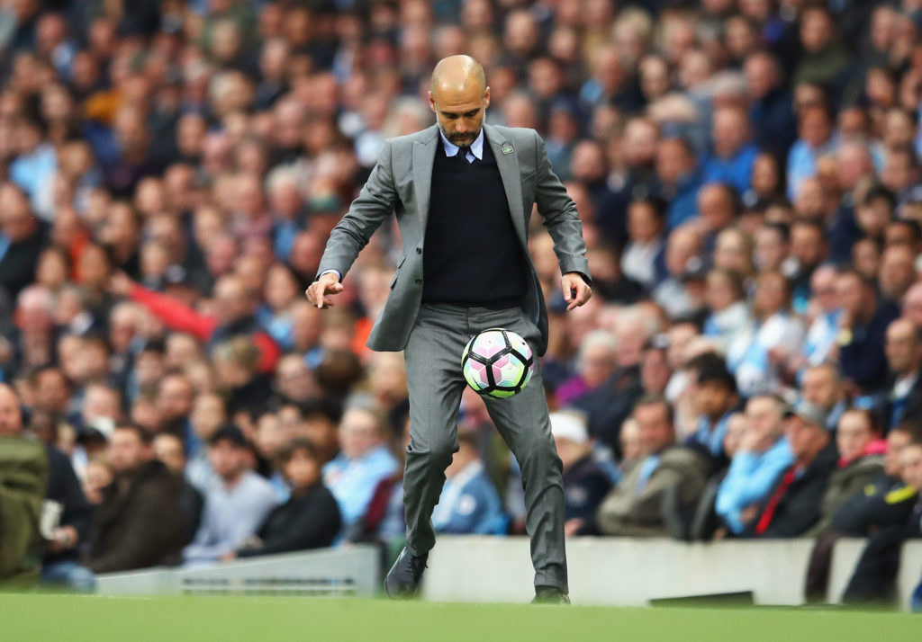 MANCHESTER, ENGLAND - MAY 16: Josep Guardiola, Manager of Manchester City kicks the ball during the Premier League match between Manchester City and West Bromwich Albion at Etihad Stadium on May 16, 2017 in Manchester, England. (Photo by Clive Mason/Getty Images)