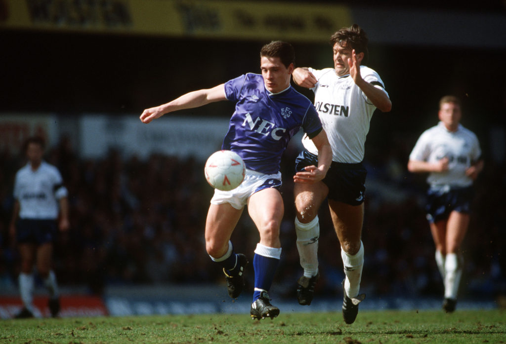 Sport, Football, pic: circa 1990, Division 1, Tottenham Hotspur,v Everton, Everton striker Tony Cottee under pressure from Tottenham Hotspur defender Gary Mabbutt, Tony Cottee a "pint sized" striker who was a prolific goalscorer had 2 spells with his local club West Ham United, 1983-1988 and 1994-1996, In 1988 he was transferred to Everton for 2,05 million a record then and spent 6 years with the Merseysiders, He won 7 England caps 1987-1989 (Photo by Bob Thomas/Getty Images)