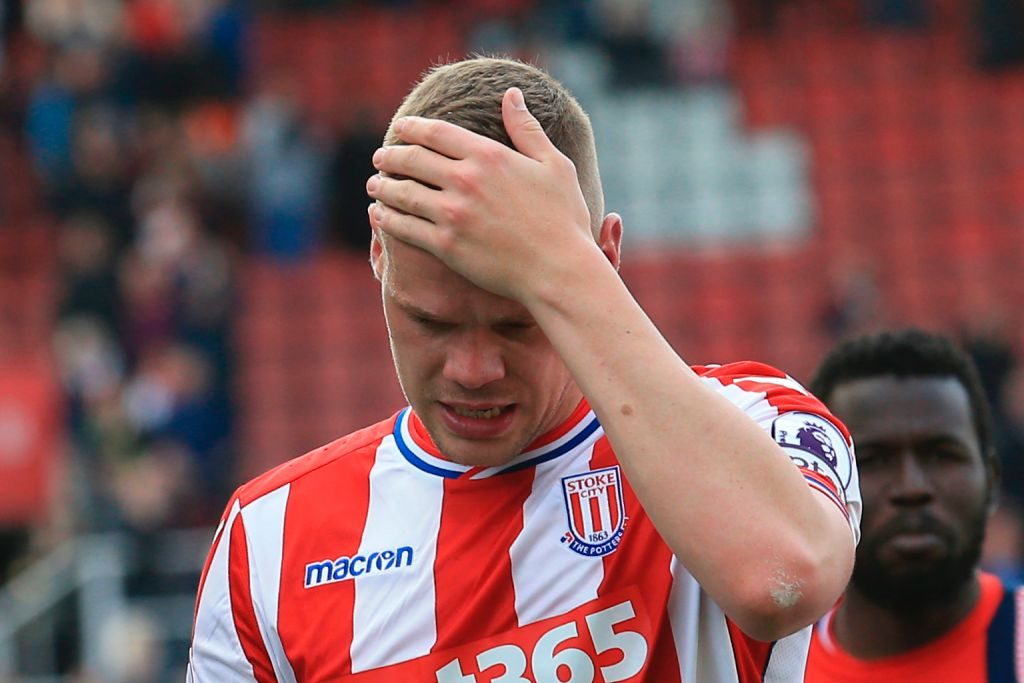 Stoke City's English defender Ryan Shawcross reacts as he leaves the pitch after the English Premier League football match between Stoke City and Arsenal at the Bet365 Stadium in Stoke-on-Trent, central England on May 13, 2017. Arsenal won the game 4-1. / AFP PHOTO / Lindsey PARNABY / R