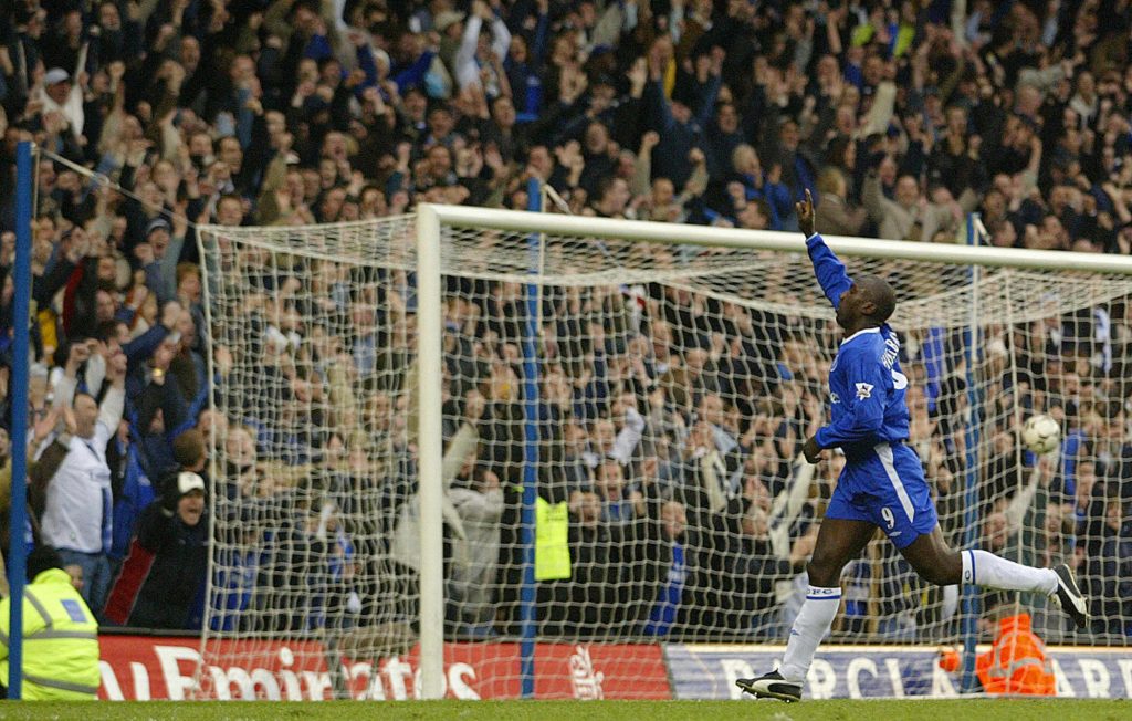 LONDON, UNITED KINGDOM:  Chelsea's Jimmy Hasselbaink celebrates after scoring his second of three goals against Wolverhampton during their Premiership football match 27 March 2004 at Stamford Bridge in London.  Chelsea won 4-2.  AFP PHOTO/Jim WATSON               'ENGLISH PREMEIR LEAGUE PICTURES - NO TELCOS, WEBSITES, USES SUBJECT TO DESCRIPTION OF license WITH FAPL ON WWW.FAPLWEB.COM FOOTBALL LEAGUE GAMES'  (Photo credit should read JIM WATSON/AFP/Getty Images)