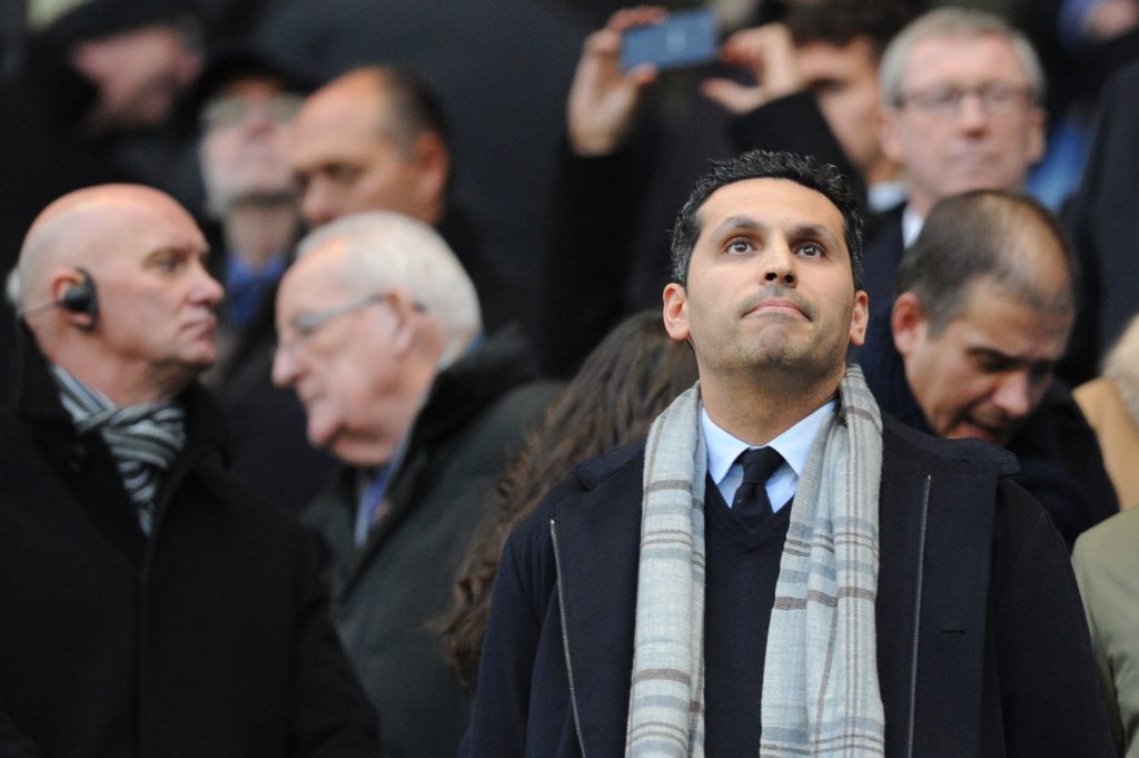 Manchester City Emirati chairman Khaldoon al-Mubarak (R) takes his place in the stands for the English Premier League football match between Manchester City and Arsenal at the Etihad Stadium in Manchester, north west England, on January 18, 2015. AFP PHOTO / OLI SCARFF RESTRICTED TO EDITORIAL USE. No use with unauthorized audio, video, data, fixture lists, club/league logos or live services. Online in-match use limited to 45 images, no video emulation. No use in betting, games or single club/league/player publications.        (Photo credit should read OLI SCARFF/AFP/Getty Images)