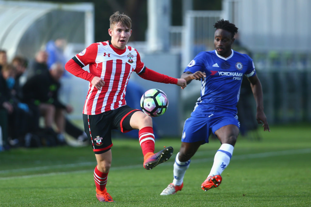 COBHAM, ENGLAND - NOVEMBER 21: Jake Vokins of Southampton is closed down by Fankaty Dabo of Chelsea during the Premier League 2 match between Chelsea and Southampton at Chelsea Training Ground on November 21, 2016 in Cobham, England. (Photo by Alex Pantling/Getty Images)