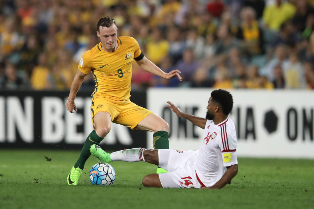 SYDNEY, AUSTRALIA - MARCH 28: Brad Smith of the Socceroos is tackled by Abdelaziz Sanqour of the United Arab Emirates during the 2018 FIFA World Cup Qualifier match between the Australian Socceroos and United Arab Emirates at Allianz Stadium on March 28, 2017 in Sydney, Australia. (Photo by Mark Kolbe/Getty Images)