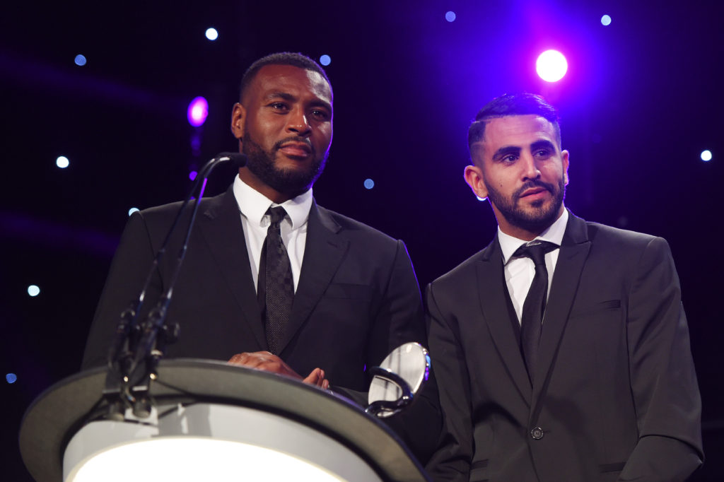 LONDON, ENGLAND - APRIL 27:  Riyad Mahrez (R) and Wes Morgan present the Governing Body of the Year award in association with XL Catlin during the BT Sport Industry Awards 2017 at Battersea Evolution on April 27, 2017 in London, England. The BT Sport Industry Awards is the most prestigious commercial sports awards ceremony in Europe, where over 1,750 of the industry's key decision-makers mix with high profile sporting celebrities for the industry's most anticipated night of the sport business calendar.  (Photo by Anthony Harvey/Getty Images for Sport Industry Awards)