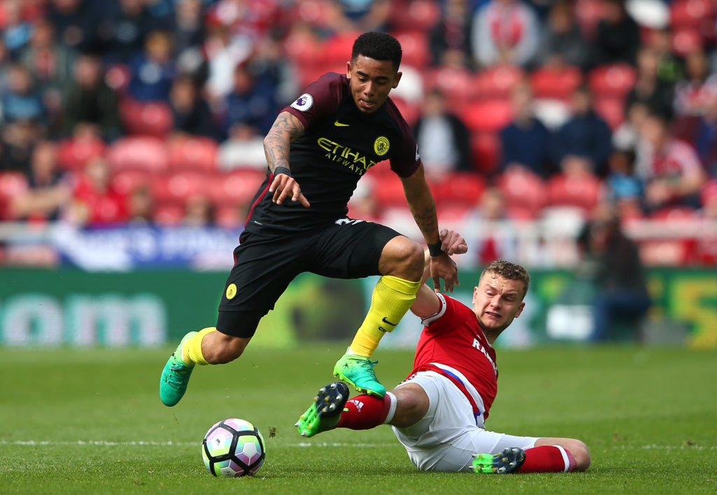 MIDDLESBROUGH, ENGLAND - APRIL 30: Gabriel Jesus of Manchester City attempts to escape the challenge of Ben Gibson of Middlesbrough during the Premier League match between Middlesbrough and Manchester City at the Riverside Stadium on April 30, 2017 in Middlesbrough, England.  (Photo by Alex Livesey/Getty Images)