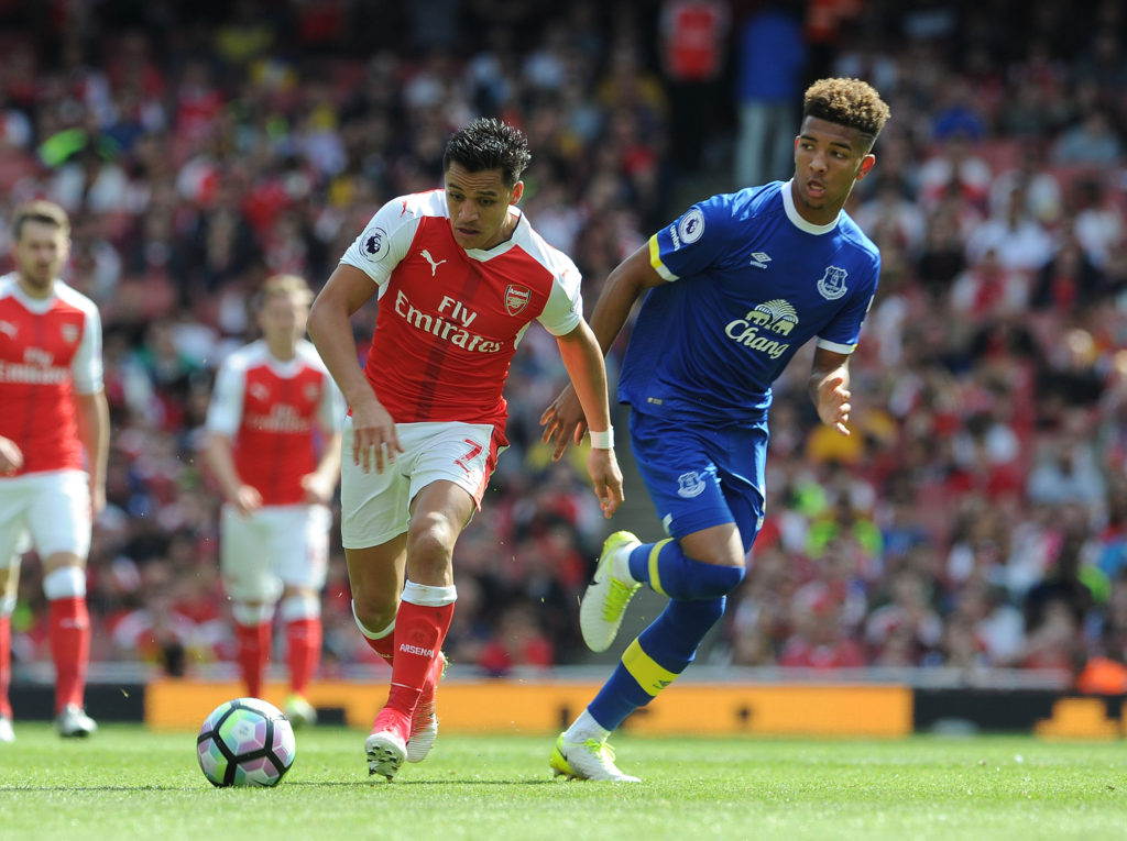 LONDON, ENGLAND - MAY 21:  Alexis Sanchez of Arsenal takes on Mason Holgate of Everton during the Premier League match between Arsenal and Everton at Emirates Stadium on May 21, 2017 in London, England.  (Photo by David Price/Arsenal FC via Getty Images)